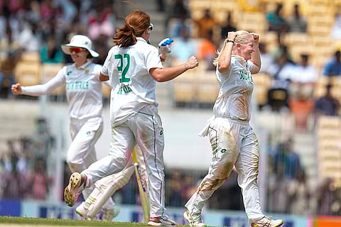 Delmi Tucker celebrates the wicket of Smriti Mandhana